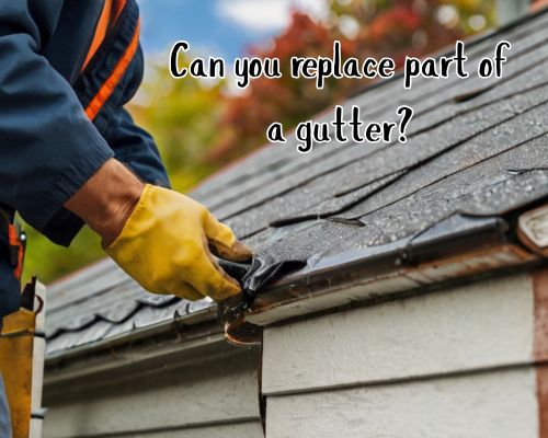 a roofer fixing out the gutter